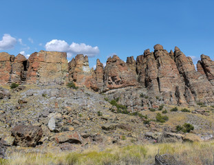 The amazing badlands and palisades of the John Day Fossil Beds clarno unit and rock formations in a semi desert landscape in Oregon State
