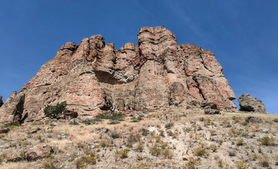 The amazing badlands and palisades of the John Day Fossil Beds clarno unit and rock formations in a semi desert landscape in Oregon State