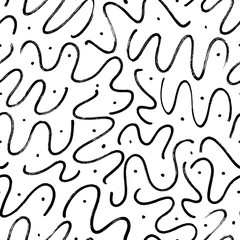 Fototapeta na wymiar Swirls and curls vector seamless pattern with dots. Grunge black paint brush strokes. Curly hair imitation doodle ornament.