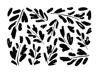 Leaves and branches vector collection. Hand drawn plant elements painted with a brush.