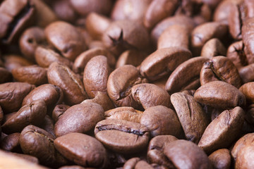 Roasted coffee beans, closeup. Background.