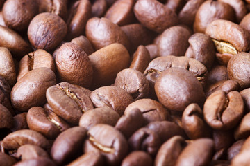 Roasted coffee beans, closeup. Background.