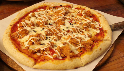 pizza with ham and cheese