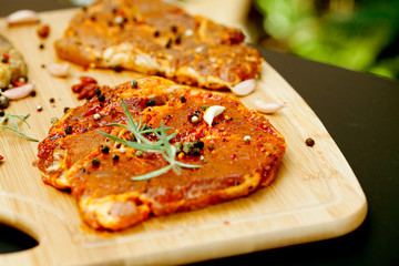 raw meat with herbs and rosemary ready for barbecue