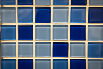 Blue ceramic mosaic on the wall as background