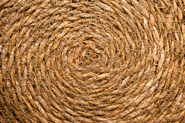 Close Up of a Round Esparto Grass Mat, Natural Fiber Background.