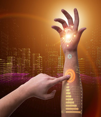 Human robotic hand in futuristic concept