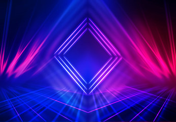 Dark abstract futuristic background. Geometric laser figure in the center of the stage. Neon blue-pink rays of light on a dark background