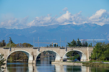 Bridge with mountains in Italy, Europe.