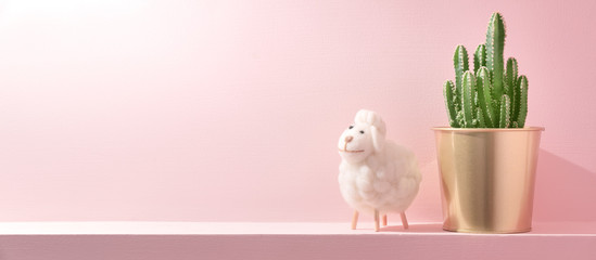 small green cactus plant and sheep