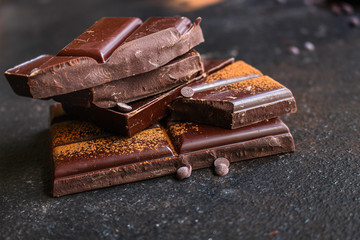 chocolate (delicious cocoa dessert, pieces ofbackground. top view. copy space sweets) menu concept....