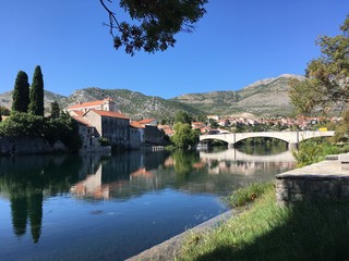 Bosnia. View of the old town Trebinje across the Trebishnitsa river.