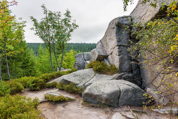 Fototapeta na wymiar Huge rocks at red mountain trail to Szrenicka Hall