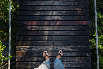 top view foot on wood bridge