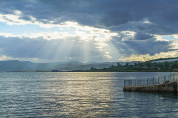 Sea of Galilee, with clouds and sun beams