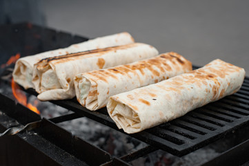 Preparation of shawarma on the grill. Street food.