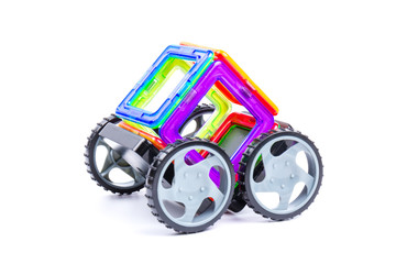 Children's toy magnetic designer, isolated on white background. close-up