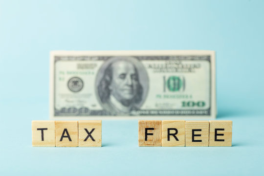 Tax free concept on a background of dollars. Tax-free purchase and sale