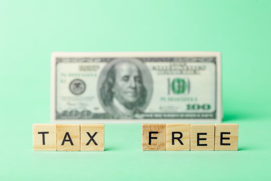 Tax free concept on a background of dollars. Tax-free purchase and sale