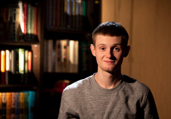 Portrait of a young man in the interior.