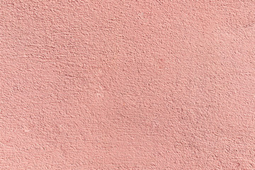 Details of the pink concrete wall texture for background.