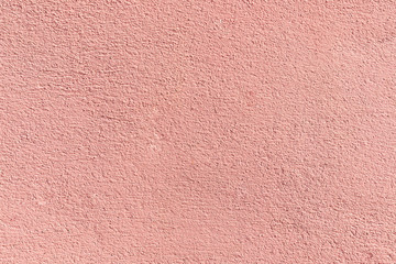 Fototapeta premium Details of the pink concrete wall texture for background.