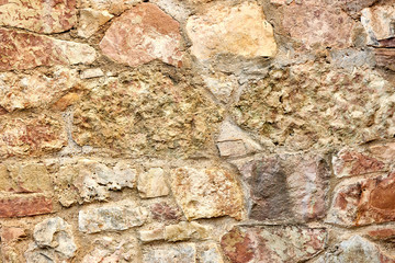 Old wall made of stone. Can be used as background.