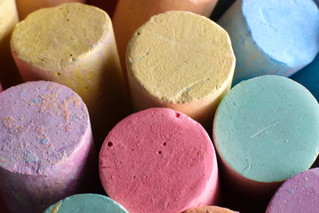 Multi-colored chalk closeup. Children's creativity, entertainment concept.