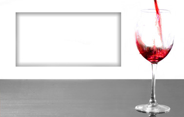 Glass with red wine and highlighted space for text. Copy space. Invitation, greeting card.