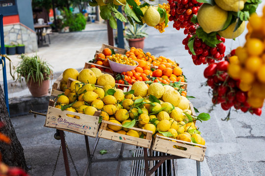Huge lemons, tangerines and cherry tomatoes are sold on the Amalfi coast in Italy.