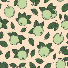 Seamless pattern with green apples on beige background. Vector illustration.