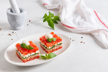 Tuna and vegetable salad portioned. Healthy nutrition, dieting, keto diet. Side view, copy space. Menu, recipe