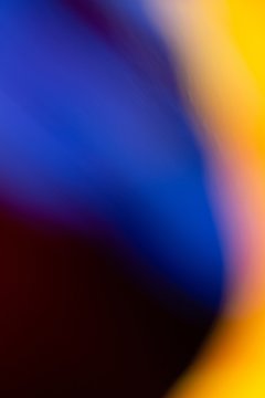 Vertical abstract illustration of soft smooth blurred black, blue and yellow background colors