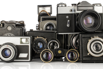 Lot of whole vintage camera isolated on white background