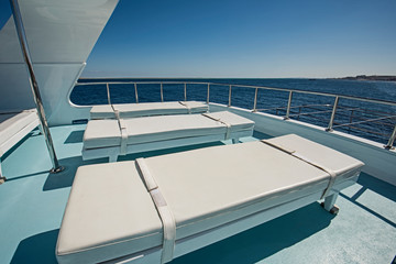 View over the sundeck of a large luxury motor yacht