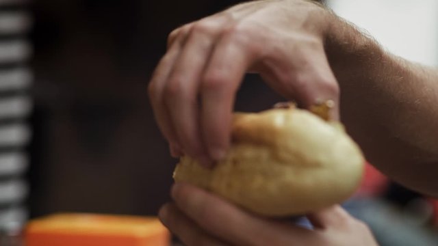 Handheld view of tourist eating street food in Vietnam. Shot with RED helium camera in 8K