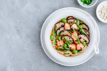 Salmon Noodle Soup with shiitake mushrooms, edamame beans and green onion.