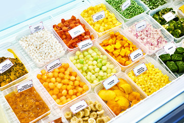 Chilled slices of fruits and vegetables in store
