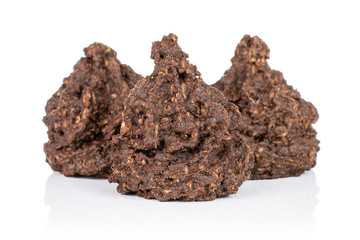 Group of three whole homemade brown coconut cocoa biscuit isolated on white background