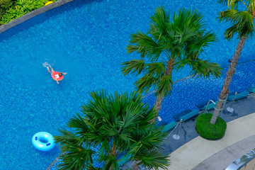 high angle view children swimming in the water park