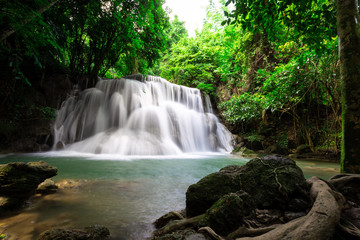Fototapeta na wymiar Waterfall with colorful trees, Huai Mae Khamin Waterfall ,Karnchanaburi Thailand
