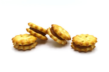 Homemade biscuits or crackers with pineapple jam and sweet flavored on white background. Cookies or snack for coffee break.