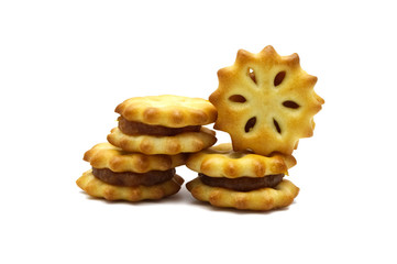 Homemade biscuits or crackers with pineapple jam and sweet flavored   isolated on white background. Cookies or snack for coffee break.