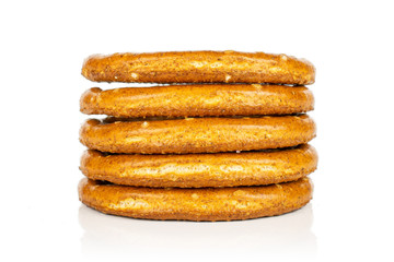Group of five whole salty brown pretzel isolated on white background