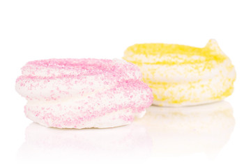 Fototapeta na wymiar Group of two whole pink and yellow sweet meringue isolated on white background