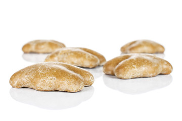 Group of five whole sweet brown gingerbread isolated on white background