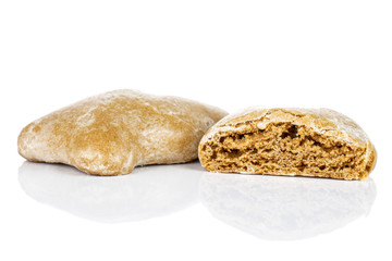Group of one whole one half of sweet brown gingerbread isolated on white background