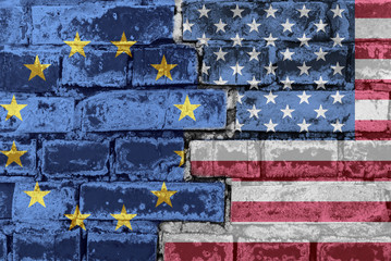The flag of the European Union and America on a brick wall