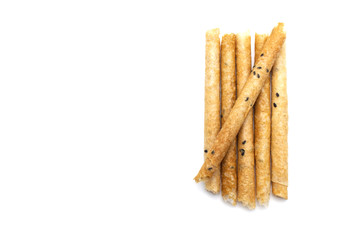 Tong Muan (crispy egg roll mix with sesame), Thai dessert Roll wafer, A traditional dessert in Thailand isolated on white background and copy space.