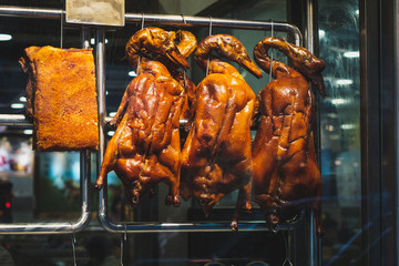 Roasted ducks, peking duck or roast goose in restaurant window  in China © hanohiki
